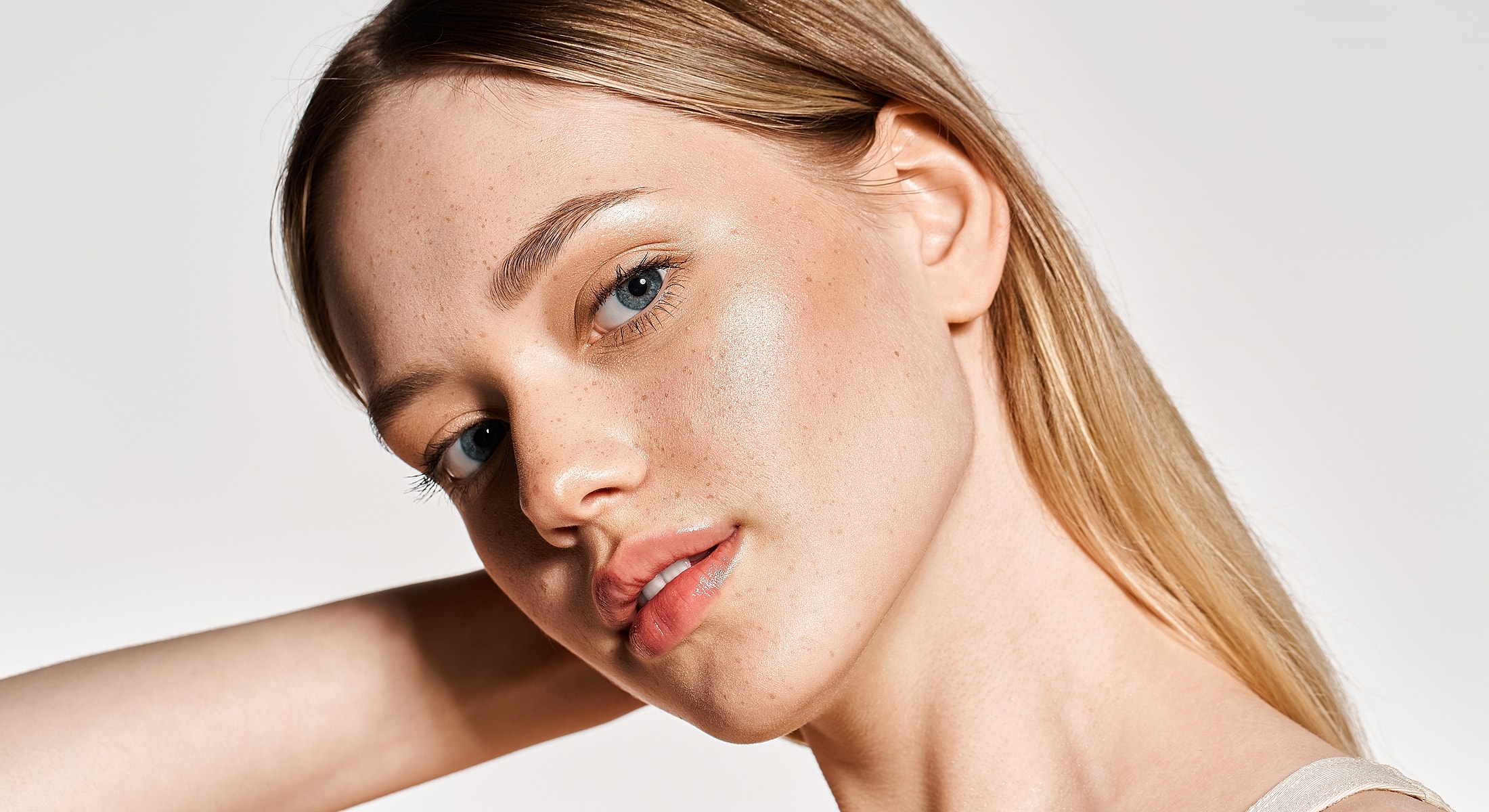 Close-up portrait of a woman with natural makeup.
